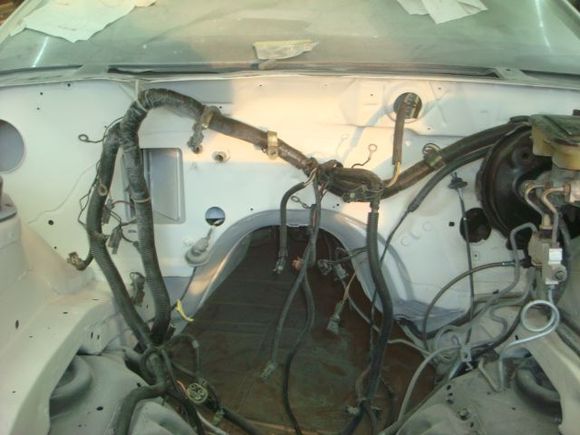 Still have to redo the heater box but roughly hanging the harness.
