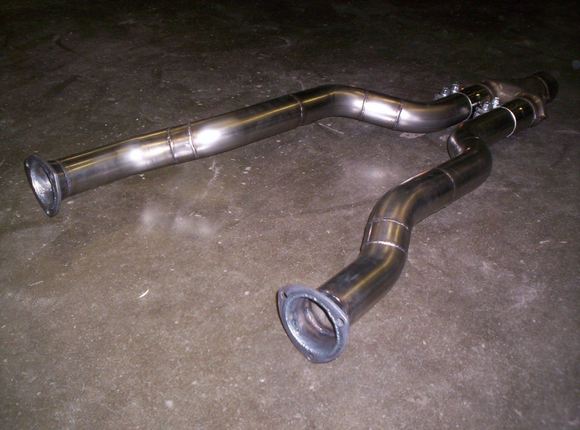 From a collection of 2-1/2" Y-J stainless bends from Vibrant. Then Tigged together with Magnaflow's 2x2-1/2" into 3" merge. It's part of a complete system now from the headers to the tailpipe plus a modified OEM crossmember so it's tucked up as tight as possible. 