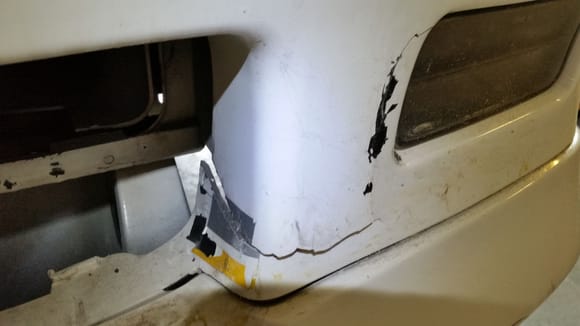 Cracked/torn bumper cover.