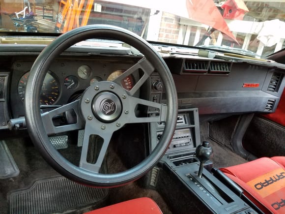 I got the stock steering wheel included, so I may try to learn how to restore it someday.  The radio functions but the display is nearly impossible to read. Took me a while to figure out how to get the stations programed...lol!
