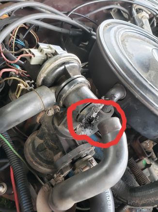 The hose got so hot it melted this sensor. I dont know what part its called but its connected to a metal hose that goes to the smog pump and 2 metal hoses come out on each side but idk where they go. I cut off the smog pump belt and put a bypass hose to the plastic piece on the air breather but it got so hot it melted it and i noticed the gas pedal was sticking a bit so I disconnected the wire in that part. The exhaust was loud but now its quiet and i can hear it rattling. Its still hesitating a