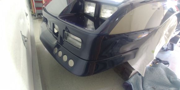 Ait intake and widened front spoiler. Still have to black out the vents