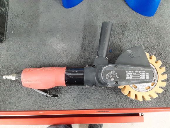 This is what the Snap-On Crud Thug looks like. It's expensive, and it takes a big air compressor to run it, but it's a MUST HAVE tool for doing this. The little eraser wheels that you put in a drill work....well, sort of. This process would take hours with one of those, and with this tool takes minutes