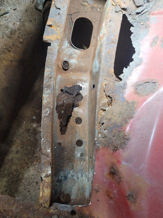 Turned the car around to start on the driver side. There was a hole in the frame under the trans mount so I had to fix that