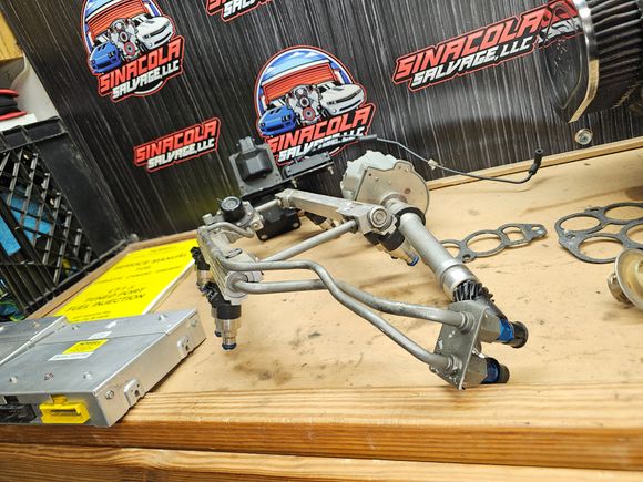 Fuel rail with AN fittings. 
