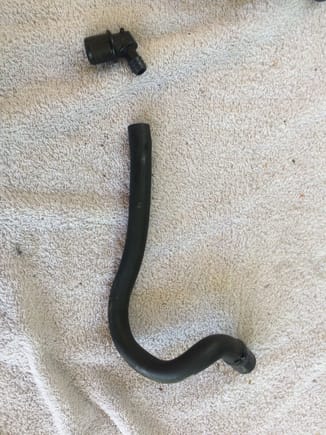 Original Crankcase Vent Tube.  It is cracked where it fit onto the fitting connected to the throttle body.