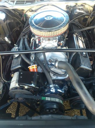 this is not a tall air cleaner and it almost hits my 2" cowl hood.a flat hood would NOT WORK.
