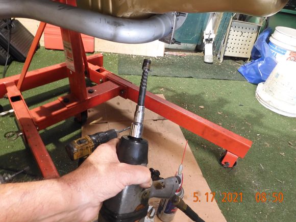Cordless impact got laughed at, anyone know the torque of one of the Dewalt cordless impacts?  My air impact finally loosened the remnants, notice is is packed with 260 ft lbs.