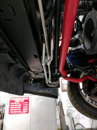 The 3/8" line was re-bent due to my head being in a dark hole. I didn't like the way the line was hitting the upper so I put the "kink" in it to give it clearance for the tube and sway bar/wonder bar.