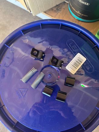 Hardware for the power steering cooler. 