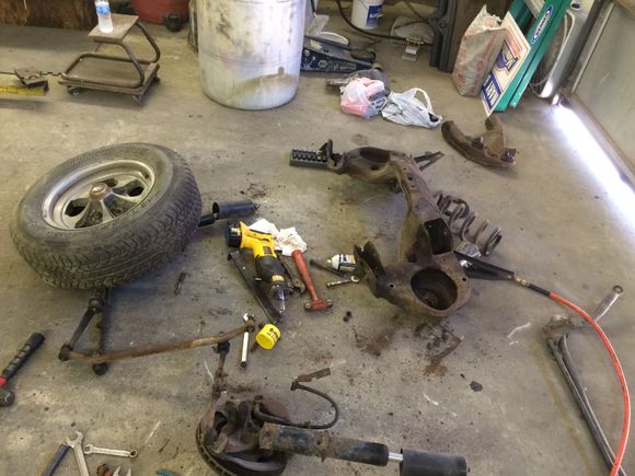 What a mess. The struts were done, the bushing in the A Arms are shot and all the bearings for the tie rod ends are spent. All is getting replaced.