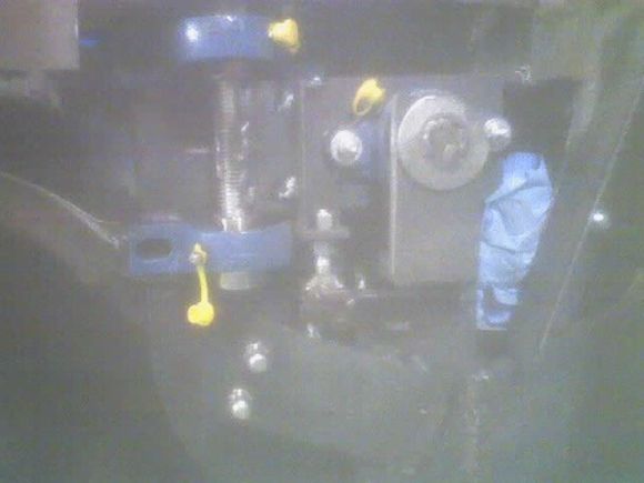 Pillow blocks provide the outward movement and flanged ones do the upward pivot. Everything was fabbed by hand.