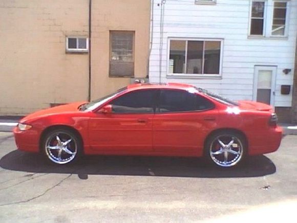 1999 Grand Prix GT, fully loaded. The most reliable car I have ever driven. It sits on 20X9.5 Helo Draggsters.