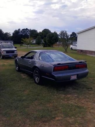 This is my 91 Firebird Coupe........mostly original.   An LO3 equipped car  Motor lightly freshend up'with a new cam,   Intake Manifold, MSD Ignition, shorty headers (for that sbc chevy *cackle* and better breathing......keeping it deceptivly stock in appearance.  I've got a built TBI 5.7 from a GMC 1500 truck owned by my younger brother (and they say you can't get power from a TBI motor...Ha!!)  Thinking about spooning it in but I don't know.....everyone does the TPI swap but I'd almost rather find me a nice dual plane intake and stick an ol'skoll Holley on top of it.  Back to the friggin' future !!!