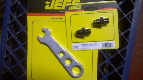 Jegs Performance -6AN trans case cooler line fittings and a -6AN wrench