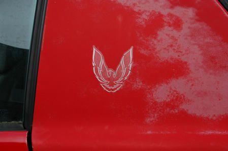 Lots of oxidation all over the car. Somebody has recently repainted the front half of the car (poorly..orange peel and chipping paint abounds), but everything from the doors back is original paint...thus is is oxidized and peeling everywhere.