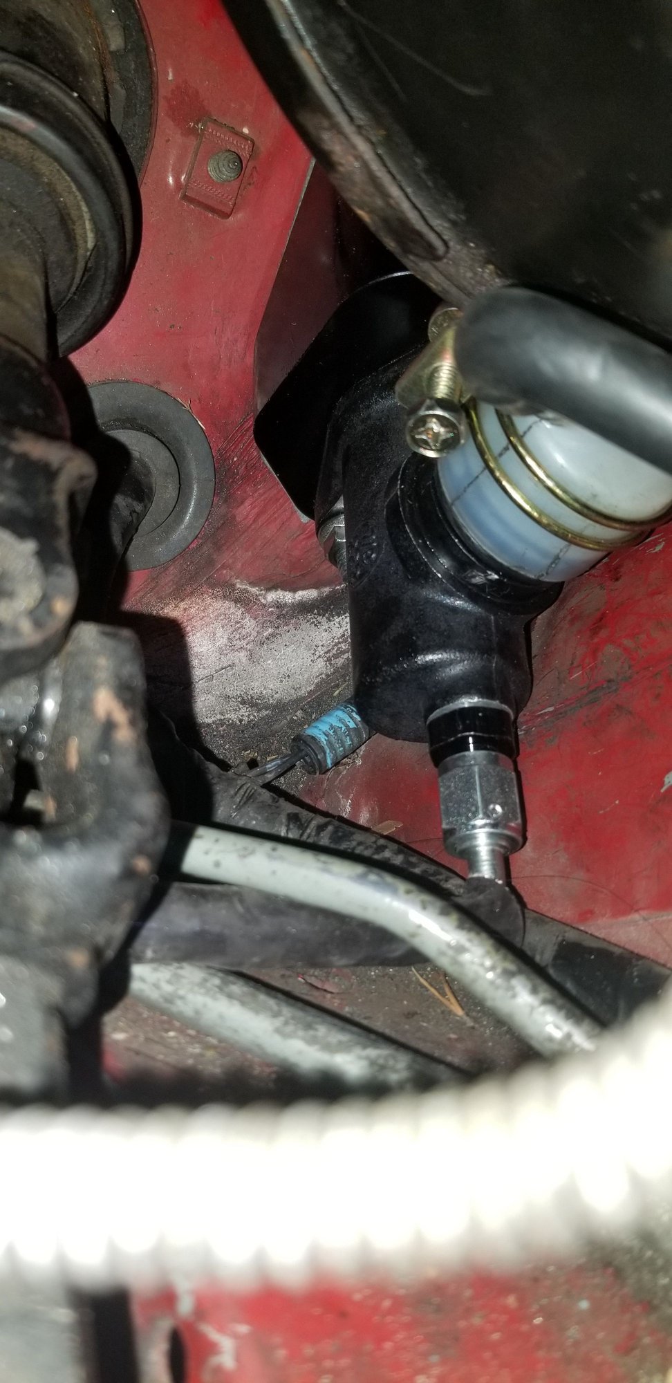 Clearance with the brake booster, plus the angle of the barb fitting I ended up settling on.