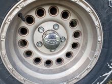 I would like to order a rim to match the others but cant find these online. Could someone help me plz 1998 gmc sierra. 