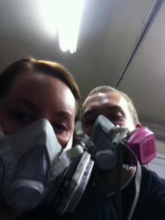 My fiance and I wearing respirators while we were applying the bed liner