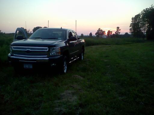 silverado to the rescue! gettin my buds deer this past archery season