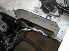 Front frame modification for stock ford power steering pump clearance