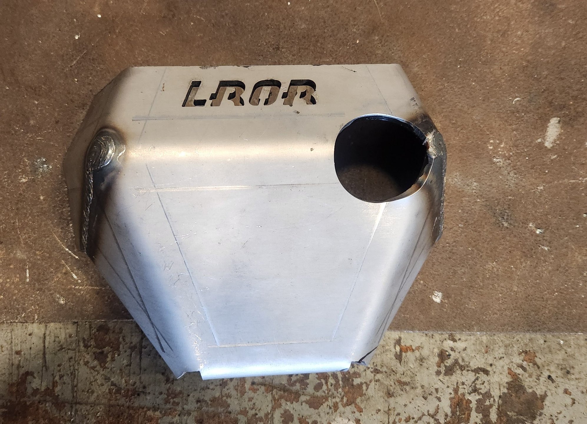 Turned truck around and pulled back into garage. Owner had this sent to me as well as some rock sliders from 4x4innovations. The fitment in this isn�t great but it does work enough to get welds around it. Painted the inside of it few days prior. Once it installed would be impossible to get adequate paint on the i side to help with rust.