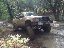 Playing on the muddy trails in upstate NY.  Before chevy 63 swap in rear, can't tell here but with 4" springs on all 4 corners had a little saggy butt.