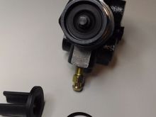 47910 26040 proportioning valve from 1989 4runner (or hilux pickup) with snap ring removed, and plastic guide prong separated.