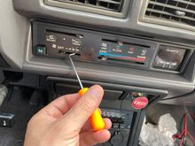 This tool is perfect for pulling the panel off. Remove the knobs, insert and lightly pull.