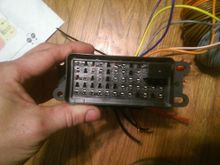 view from the top.  Many of the holes are plugged as each relay takes up 6 positions, but only uses 4.  Top right you can see a micro II 35A SPST relay installed.  Great little system using Metri-pack