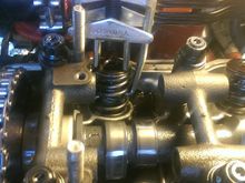 compressing the springs....