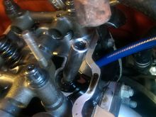 Using a 12MM deep socket and rubber mallet to slightly bump and seat the seal into place with even pressure all around