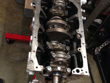 Arrows facing crank hope this helps atleast for the oil strainer bolt locations