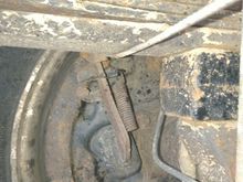 Left hand side for comparison, not the arm extends along the seem of the rubber boot.