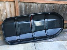 The lid survived in one piece. All of the rivets pulled out.