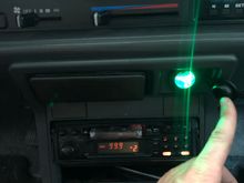 the light is on as long as the outlet is on, so you can keep the dust cover on it if the light bothers you.  