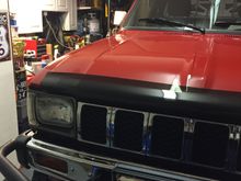 I wet sanded the clear with the wrong grit and polished it out so I'll wet sand it again to get the scratches out of the clear. but not bad for a rattle can job. Two more additions went on this Summer. The Bug Shield by gt styling 781715 and the Grille Guard made for a JEEP