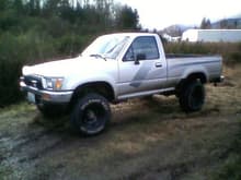 The day after i got it couldnt stand the white wheels.... a set of 235 15.s  on it