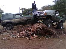 me and my buddy and his bronco II this pile of brush is bigger than it looks