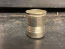 Rivnut, like a threaded rivot.