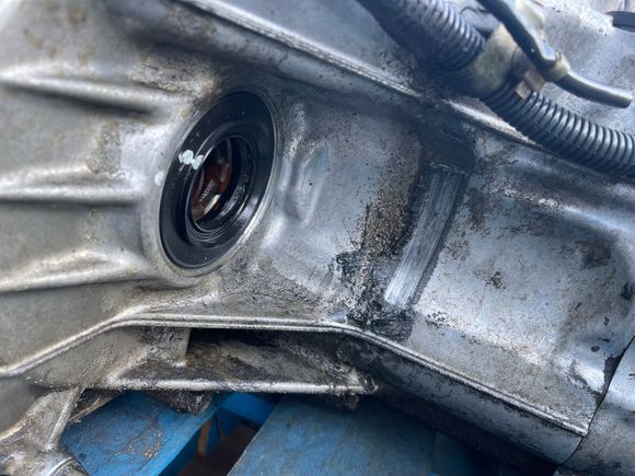 Trans housing worn where CV band spins. Trans considerably dirtier than expected for alleged mileage.