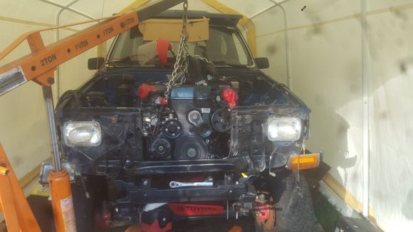 so im dropping a 2jzgte into my 4runner. the motor is in still have a ways to go before its finished but since this is where the motor sits height wise im gonna either have to run a hood scoop or a body lift. i would like to stray away from a body lift if possible but dont want the hood scoop to be enormous,so my question is for a body lift is there a difference in the body mounts between the manual and auto?