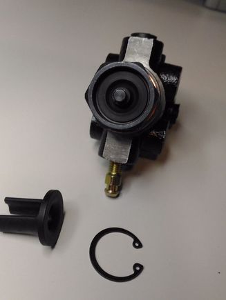 47910 26040 proportioning valve from 1989 4runner (or hilux pickup) with snap ring removed, and plastic guide prong separated.