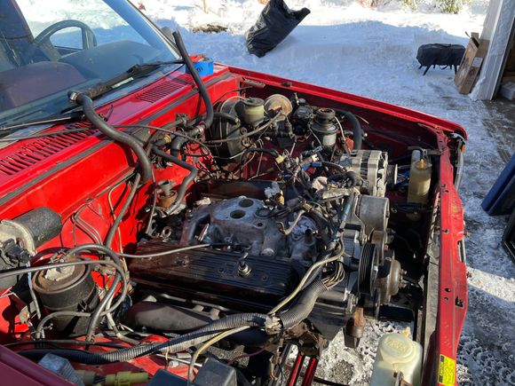 This is what a 305 Chevy looks like in a 4runner engine bay.