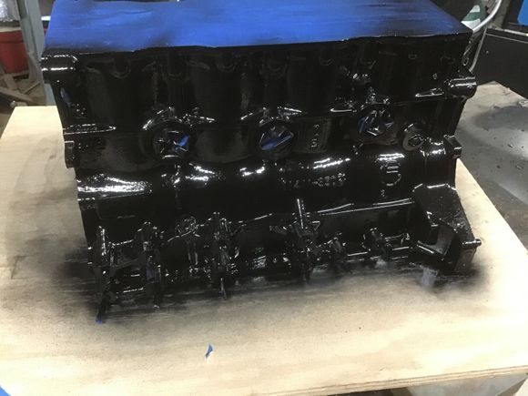 Tentatively planning on a black block, natural aluminum head and polished aluminum or red valve cover. 