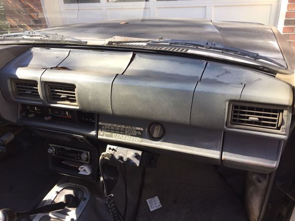 Dash badly cracked in several places, worst feature of interior: plan to research dash covers.