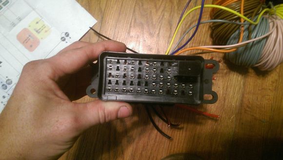 view from the top.  Many of the holes are plugged as each relay takes up 6 positions, but only uses 4.  Top right you can see a micro II 35A SPST relay installed.  Great little system using Metri-pack