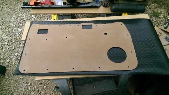 I was careful to double check the position and alignment of the holes for the fasteners.  and because I'm not fancy and wanted to cut a bunch of tiny rectangular holes, I used the same drill for the upper metal tab holes.