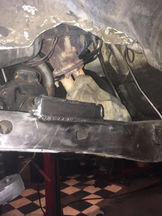 kit provided these 5"x2" plates to weld into the hole on the motor mount when you remove the IFS brackets