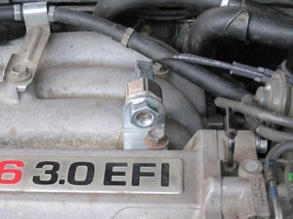 View from front of truck. Looking at nut that's screwed onto the sensor